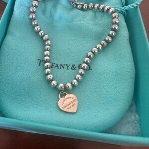 TIFFANY & CO. Return to Tiffany Heart Tag Bracelet in Rubedo Metal with Sterling